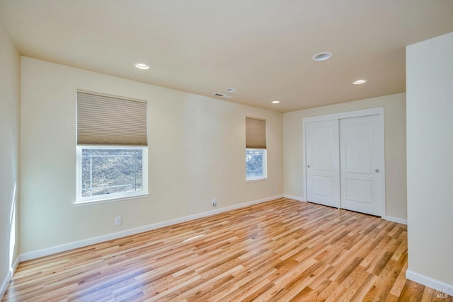 19316 N Shore Ct, Hidden Valley Lake, CA 95467 - unfurnished bedroom featuring baseboards, recessed lighting, light wood-style floors, and a closet