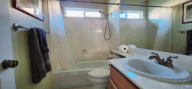 full bathroom with tile patterned flooring, shower / bath combo, toilet, and vanity