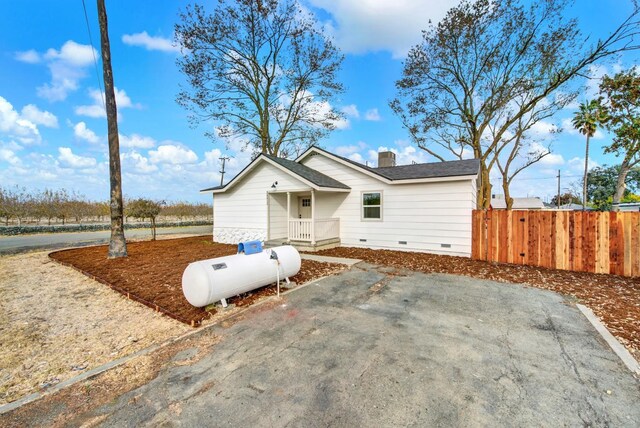 view of patio / terrace featuring a storage unit