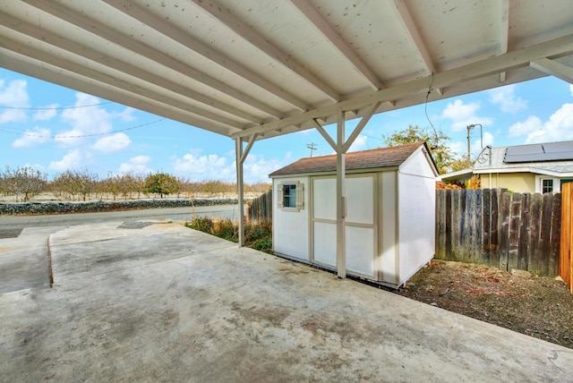 view of shed featuring a fenced backyard