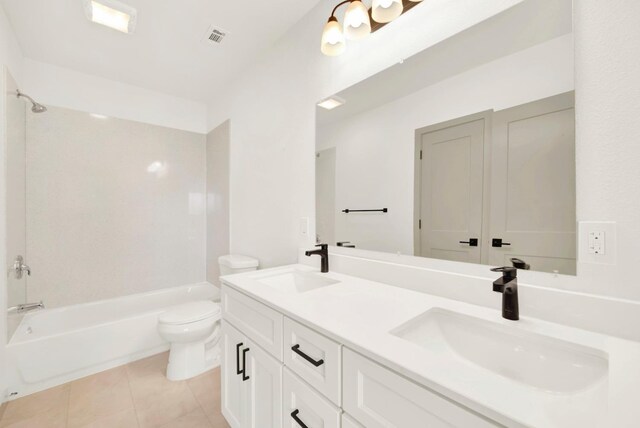 kitchen with appliances with stainless steel finishes, white cabinetry, and sink