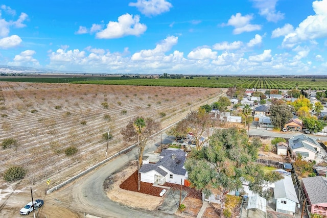 birds eye view of property featuring a rural view