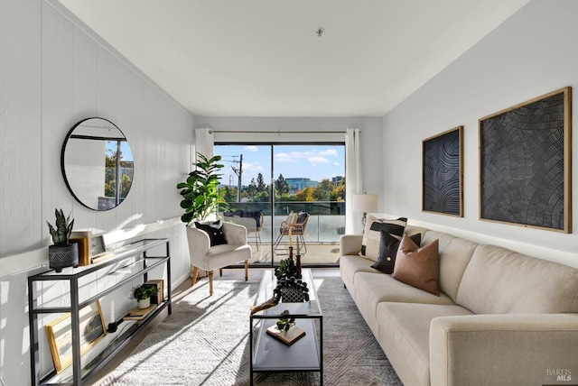 living room featuring wood walls