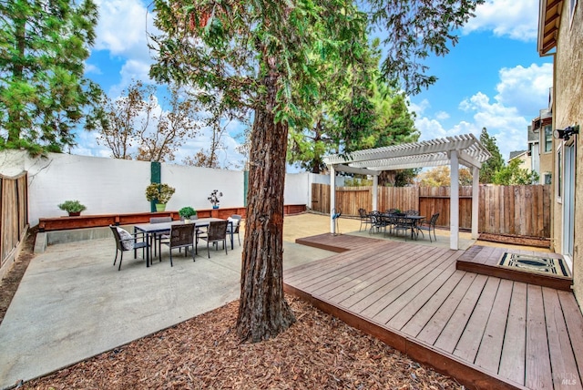 wooden terrace featuring a pergola