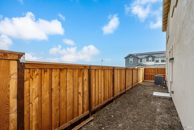 view of yard featuring central AC