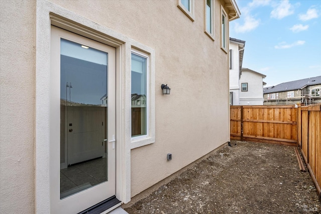 property entrance with a patio