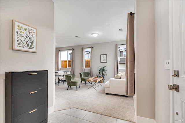 living room featuring light colored carpet