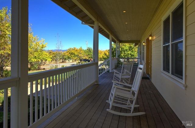 deck featuring covered porch