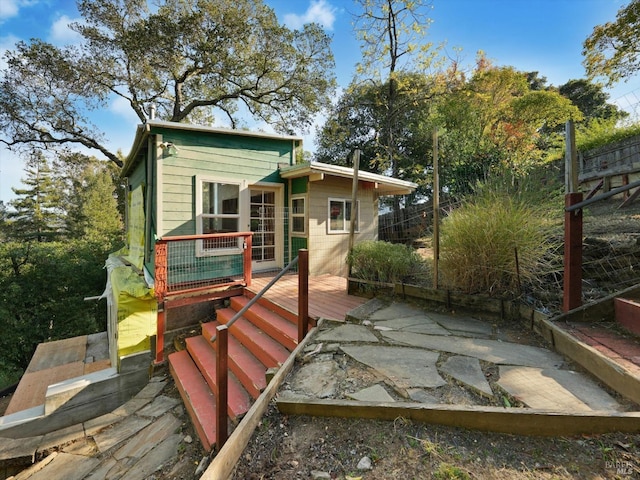 rear view of house with a deck