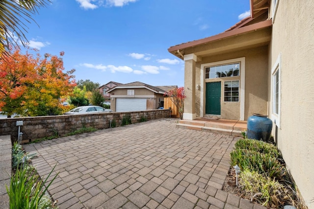 view of patio / terrace with a garage