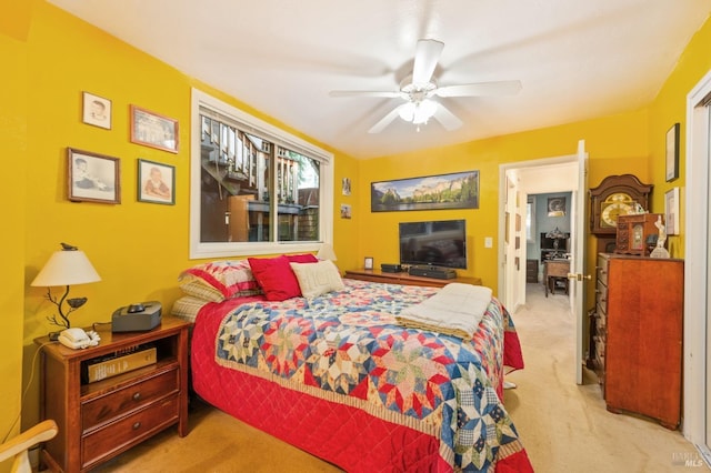 bedroom featuring carpet and a ceiling fan