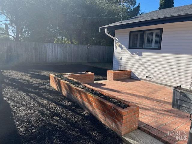 exterior space featuring fence