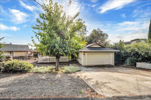 19207 Ravenhill Rd, Hidden Valley Lake, CA 95467 - exterior space featuring concrete driveway and fence