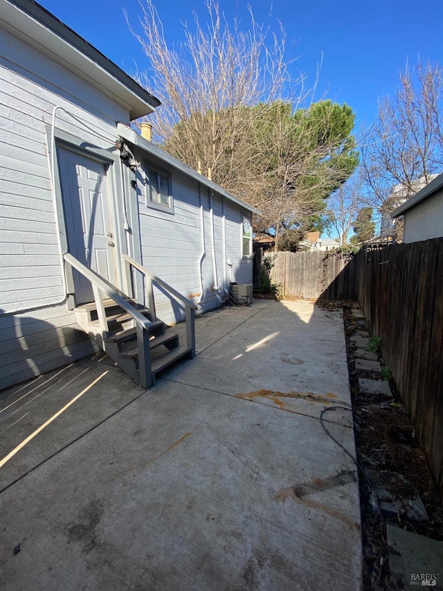 view of patio / terrace featuring entry steps and a fenced backyard