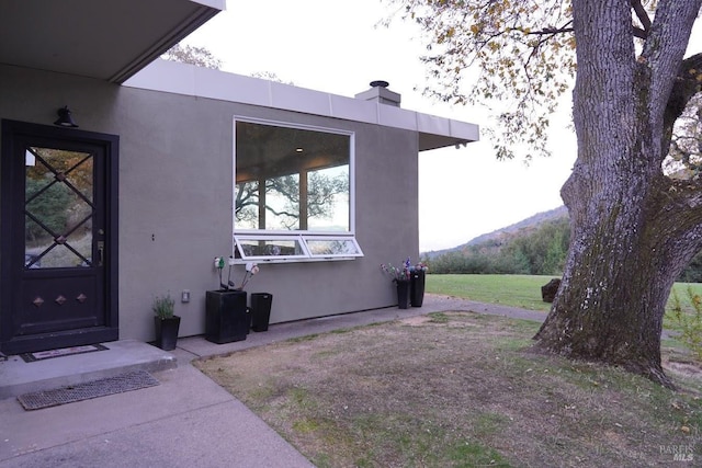 doorway to property featuring a mountain view