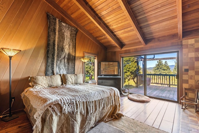 bedroom with access to outside, wooden walls, hardwood / wood-style floors, and wood ceiling