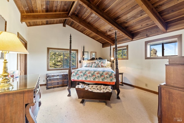 carpeted bedroom with vaulted ceiling with beams, multiple windows, and wood ceiling