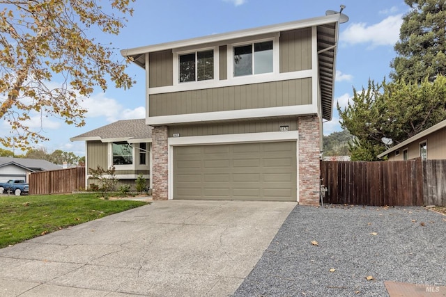 view of front facade featuring a garage and a front lawn