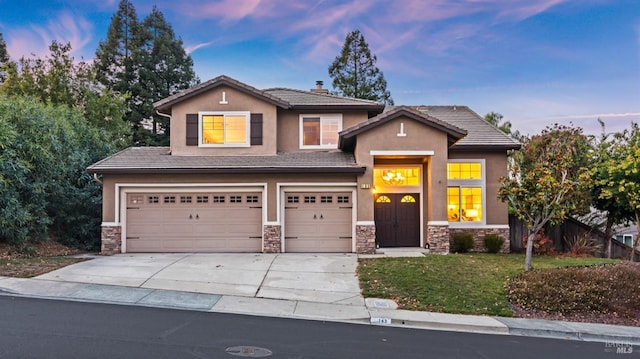 view of front of property featuring a garage