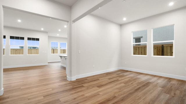 unfurnished room featuring light hardwood / wood-style floors