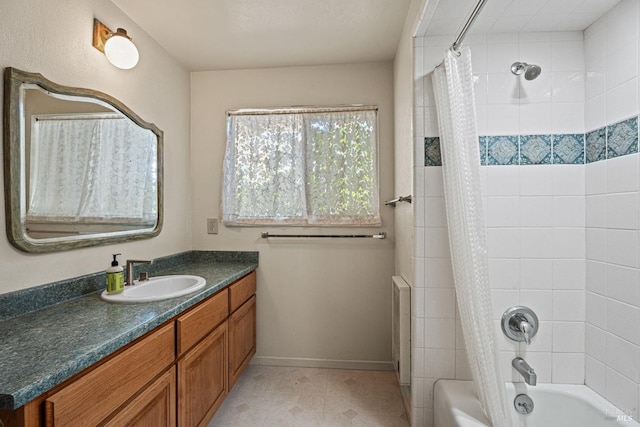 bathroom with vanity and shower / bath combo