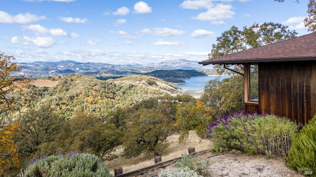 view of mountain feature featuring a water view