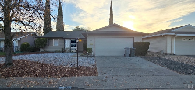 single story home with a garage