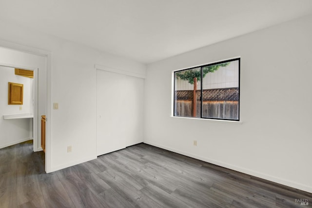 spare room featuring hardwood / wood-style floors