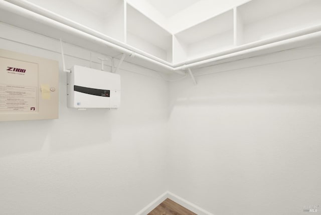 spacious closet featuring wood-type flooring