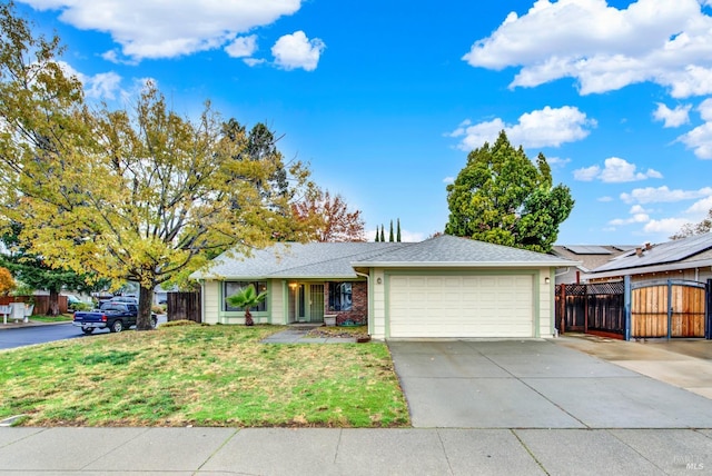 single story home featuring a front yard and a garage