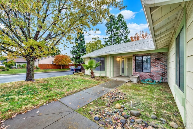 view of front of house with a front lawn