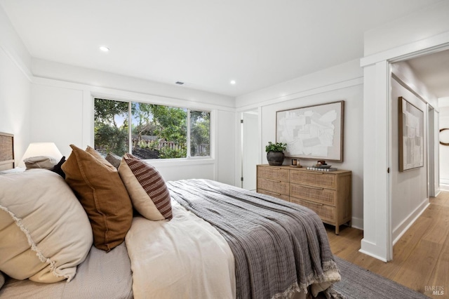 bedroom featuring light wood-type flooring