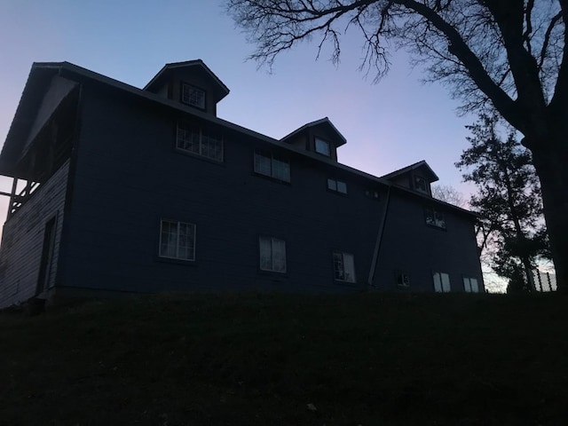 view of property exterior at dusk