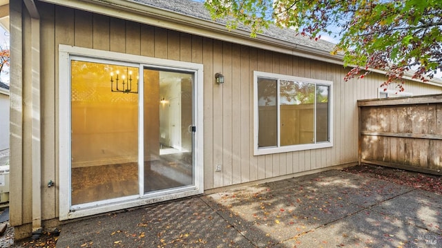 entrance to property featuring a patio area