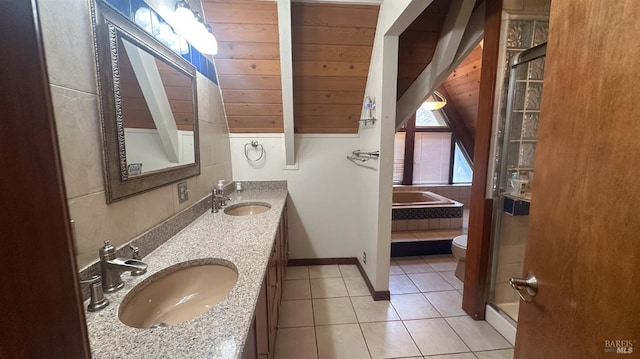 full bathroom featuring wooden ceiling, tile patterned flooring, lofted ceiling, toilet, and vanity