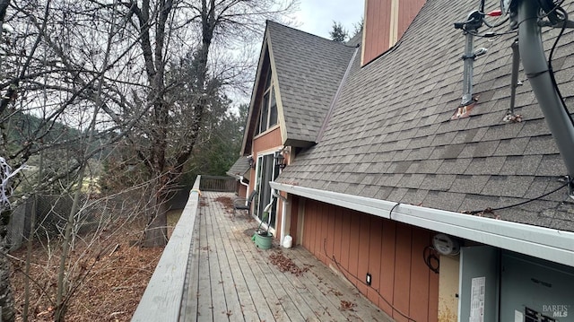 view of property exterior featuring a wooden deck