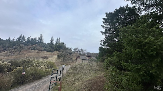 view of street featuring a rural view