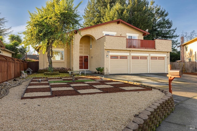 view of front facade with a balcony and a garage