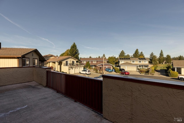 view of patio / terrace with a balcony