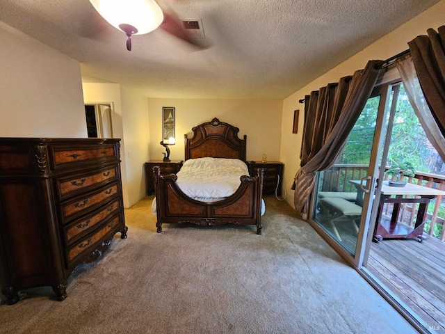 bedroom with access to exterior, light carpet, a textured ceiling, and ceiling fan