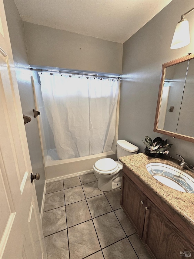 full bathroom featuring tile patterned floors, vanity, toilet, and shower / tub combo