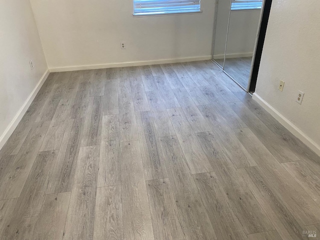 empty room featuring light wood-type flooring