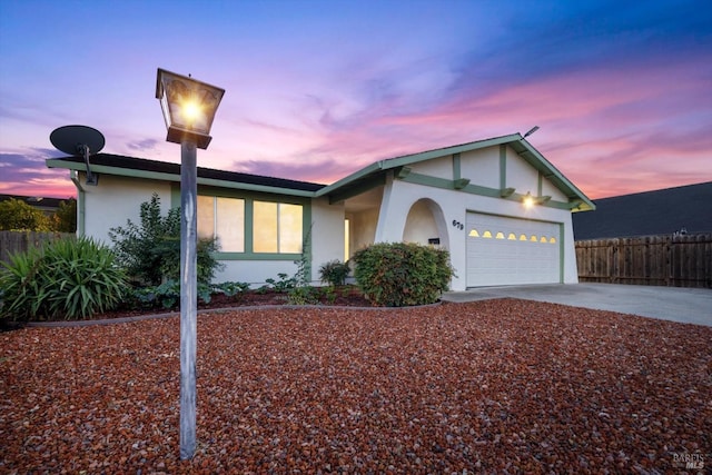 single story home with a garage