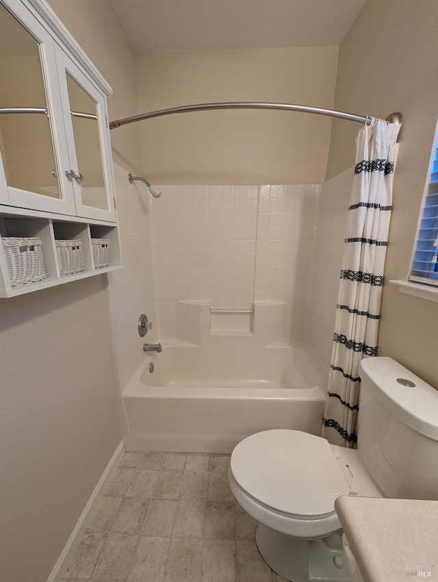 bathroom with shower / bathtub combination with curtain and toilet