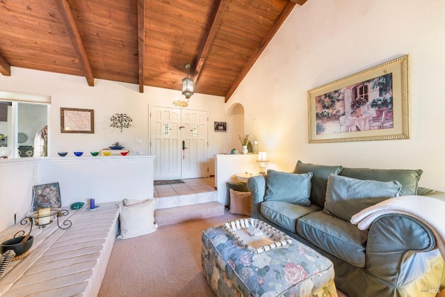 living room featuring beamed ceiling, light colored carpet, wooden ceiling, and high vaulted ceiling