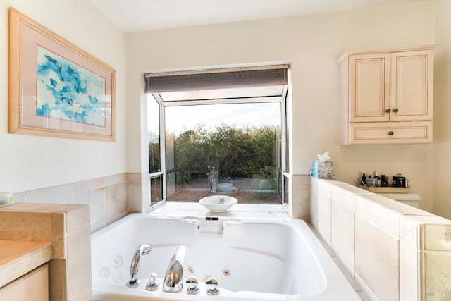 bathroom featuring tiled tub