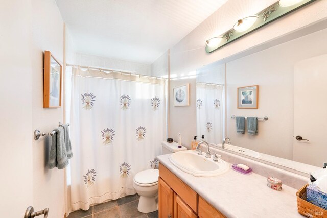 bathroom with a shower with curtain, vanity, and toilet