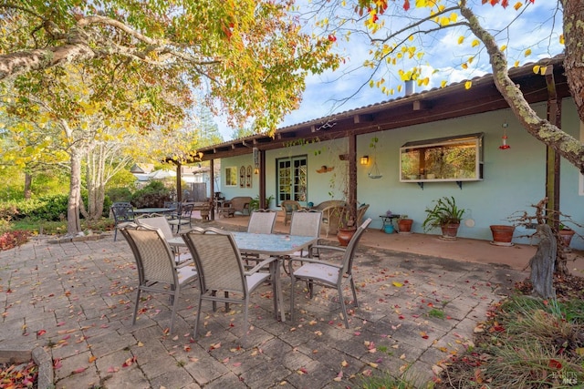 view of patio / terrace featuring french doors and outdoor dining area