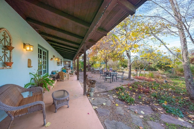 view of patio with an outdoor living space and outdoor dining space