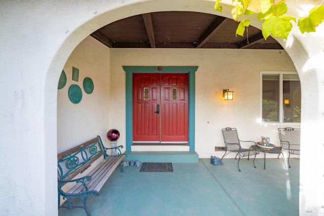 doorway to property featuring a porch